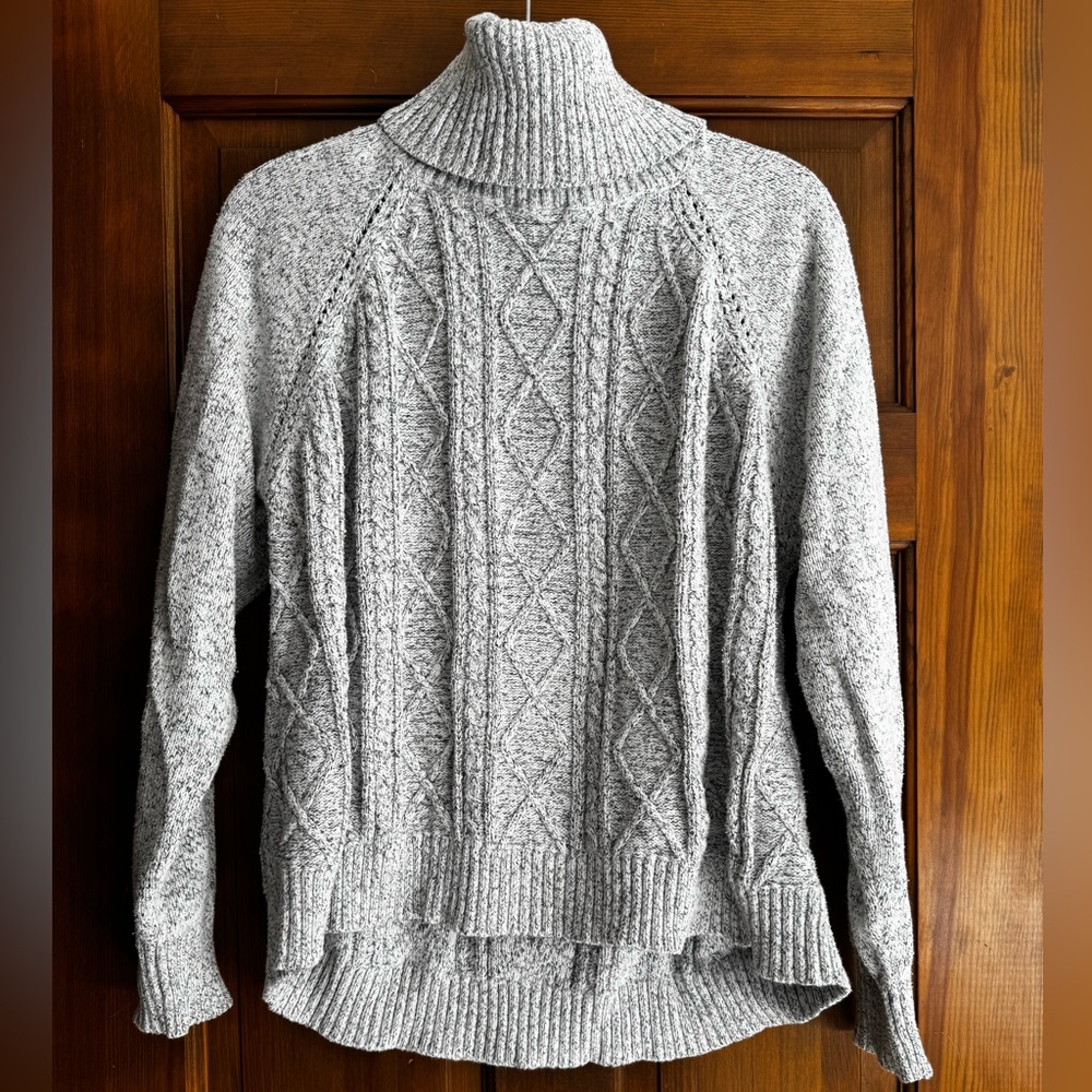 Gray cable knit turtleneck sweater